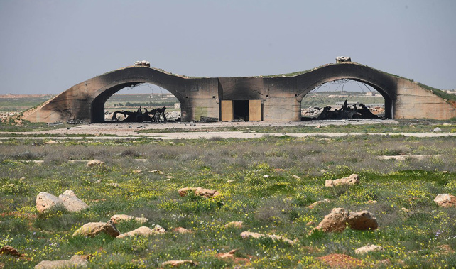 Burned Syrian jets at the Shayrat air base after the cruise missile strike (Supplied)