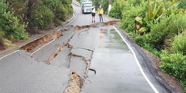 Vehicle access was blocked off and a house was condemned after a 20m section of road slumped. Photo/Supplied