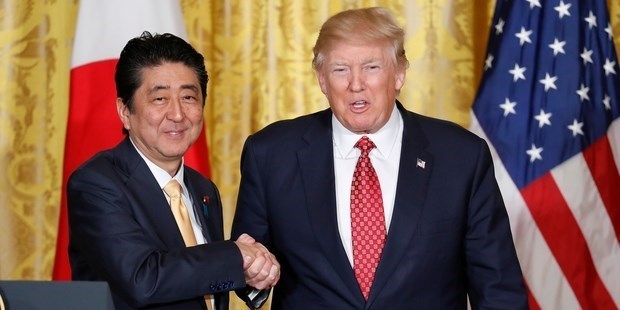 FEBRUARY 11: WHO - Japanese Prime Minister Shinzo Abe. DISCUSSED - Trade and defence. AWKWARD MOMENT - An excruciating 19-second handshake after which Mr Abe appeared to roll his eyes in relief.