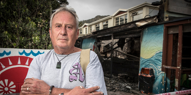 Piha fish and Chip shop owner Adrian Doggett (Michael Craig).