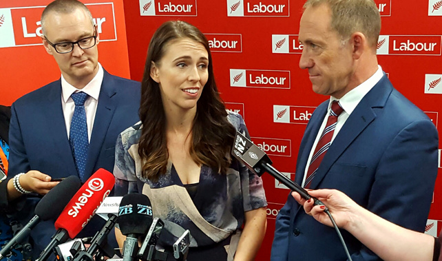 Ardern, centre, with Andrew Little and David Clark 