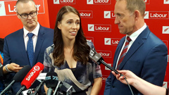 Ardern, centre, with Andrew Little and David Clark