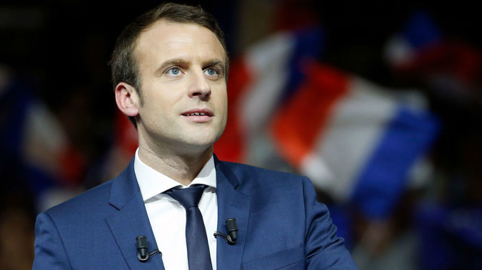 Emmanuel Macron overcame the odds to win the election and believes his presidency can unite a divided nation. (Getty)