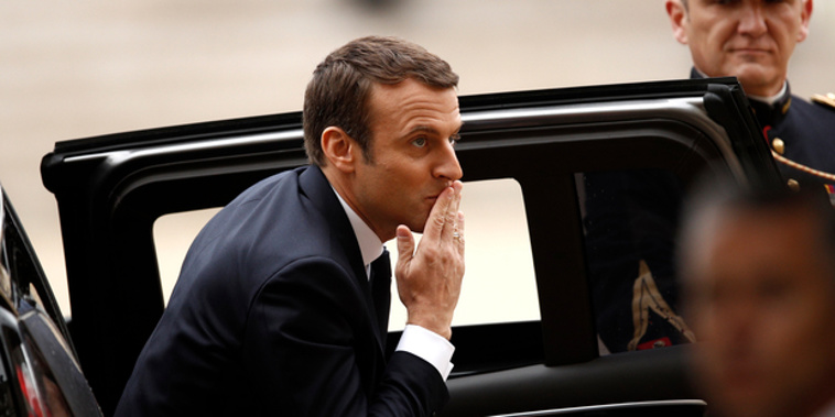 Incoming French President Emmanuel Macron blows a kiss as he arrives at the Elysee Palace before his inauguration ceremony as French President. Photo / AP