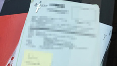 An incident file which was left on the dashboard of a police car, revealing the name and address of a sexual assault victim. Photograph supplied