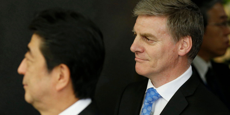 New Zealand Prime Minister Bill English, right, meets with Japan's Prime Minister Shinzo Abe at Abe's official residence in Tokyo. Photo / AP