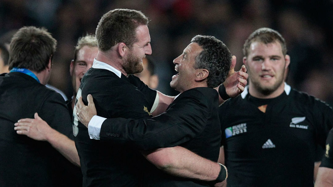Wayne Smith celebrates the All Blacks 2011 RWC title with Kieran Read. Photo / Brett Phibbs
