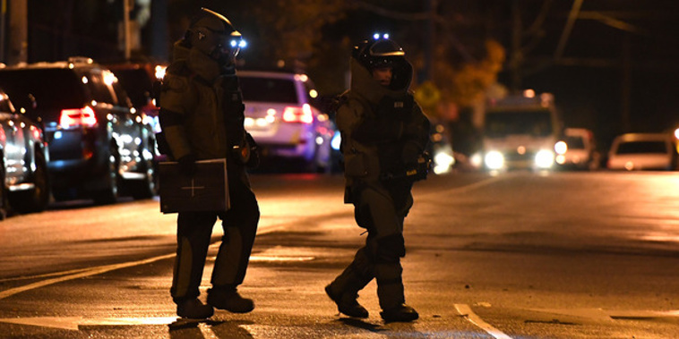 Bomb squad police are seen in Bay Street in Brighton in Melbourne. Photo / AAP