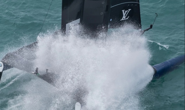 Artemis Racing engulfed by water during racing yesterday. Photo / Ricardo Pinto