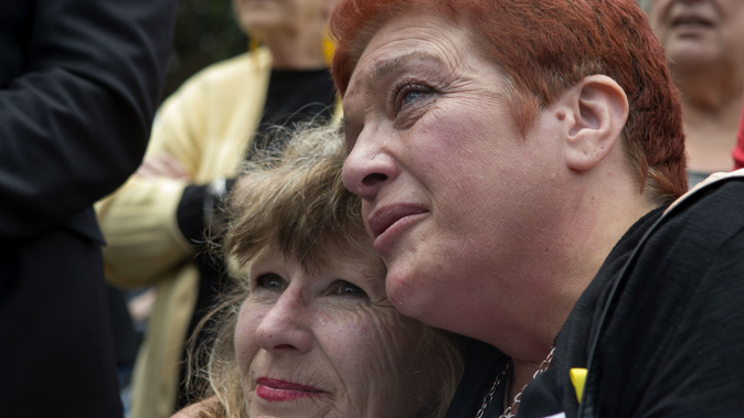 Anna Osborne (right), is comforted by her sister-in-law Sherryl Osborne, after a protest speech at Parliament in December last year. Photo/File