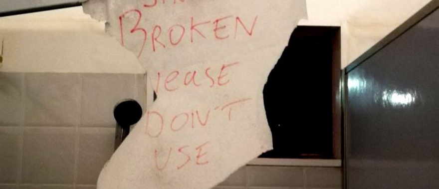 A broken shower sign at the accomodation provided to international students volunteering on the Campaign for Change (Politik.co.nz)