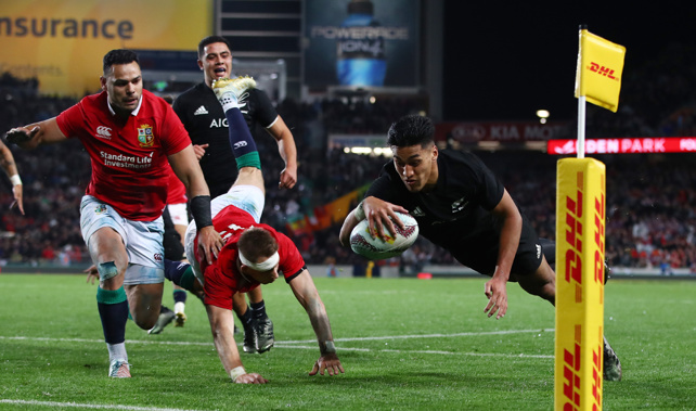 Rieko Ioane of the All Blacks dives over to score his team's second try (Getty Images) 