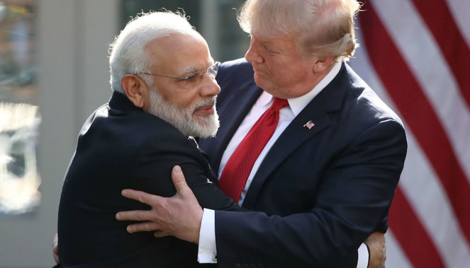 President Donald Trump and Indian Prime Minister Narendra Modi embrace while delivering joint statements in the Rose Garden of the White House. (Getty)