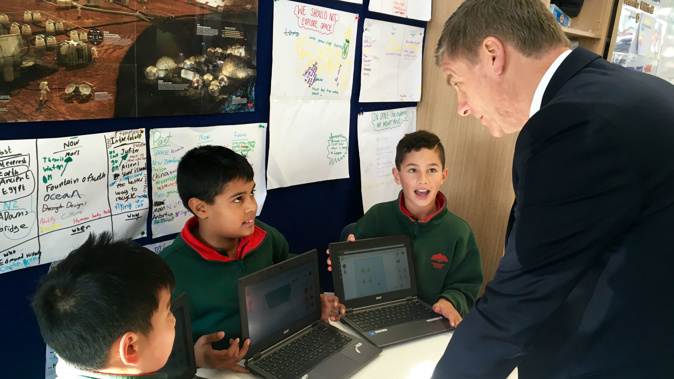 Prime Minister Bill English talks to students at Newmarket Primary School (Rosie Gordon)