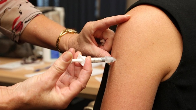 The Auckland Regional Public Health Service has blamed low vaccination rates for fuelling the city's outbreak. (Photo \ Getty Images)