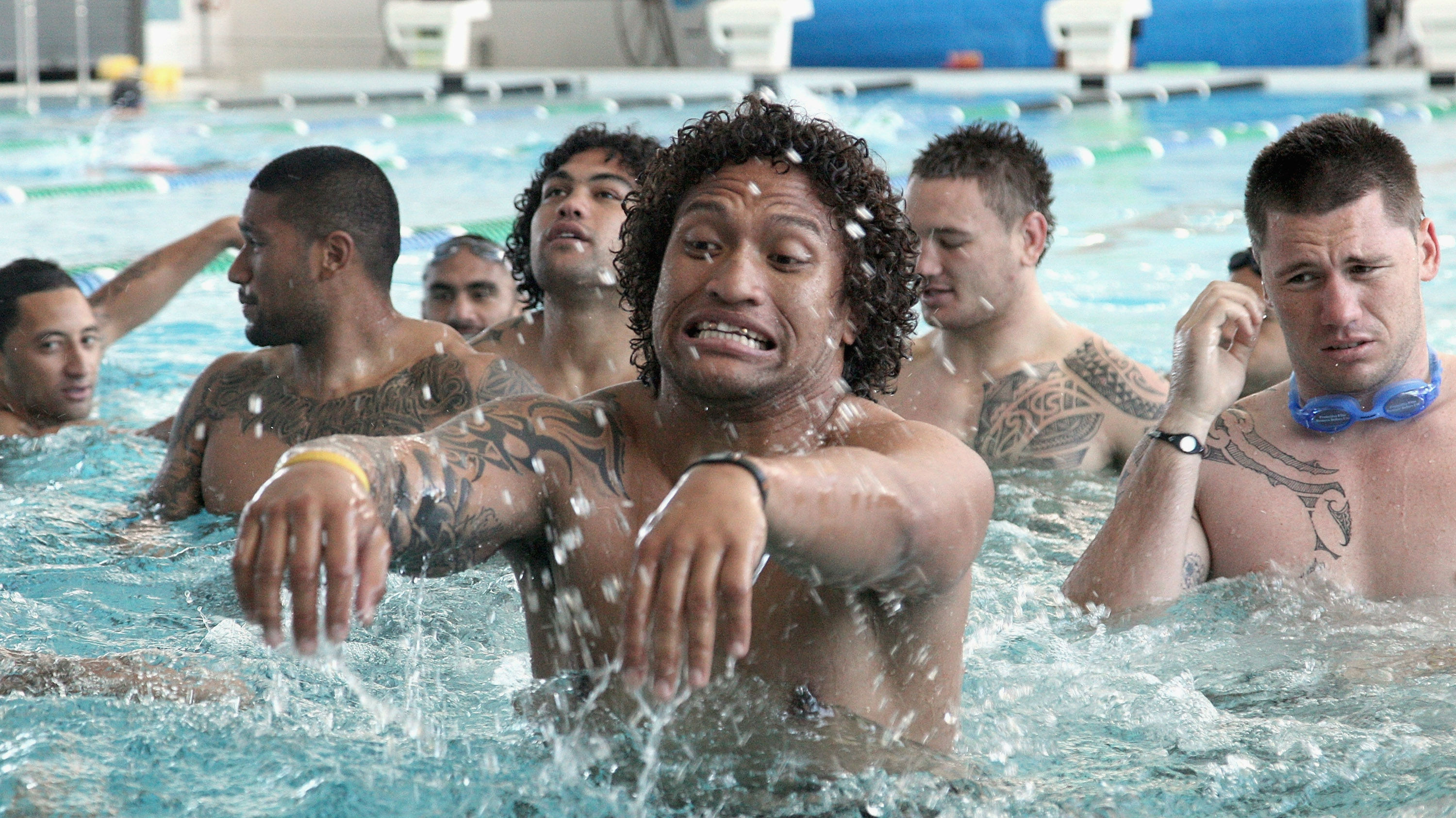 Manu Vatuvei of the Kiwis jumps into the pool during a New Zealand Kiwis pool session at Freyberg pool on October 19, 2010 in Wellington, New Zealand. Getty Images.