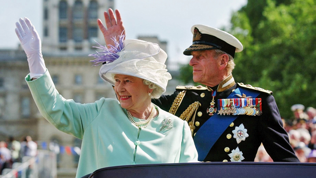 Queen Elizabeth II and Prince Phillip the Duke of Edinburgh wave to the crowd, 2005