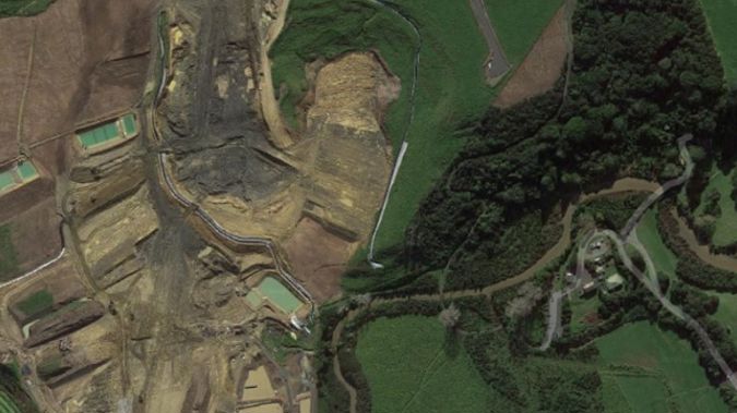 Aerial imagery shows the development behind Long Bay Beach. (via Google)