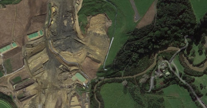 Aerial imagery shows the development behind Long Bay Beach. (via Google)