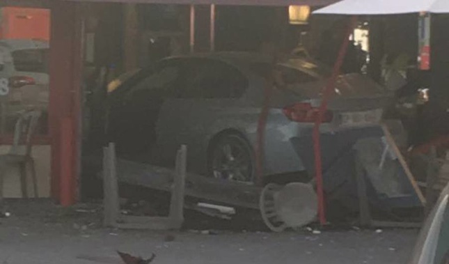 An eight-year-old girl was killed after a driver "intentionally" crashed his car into a busy pizzeria near Paris. Photo / Twitter