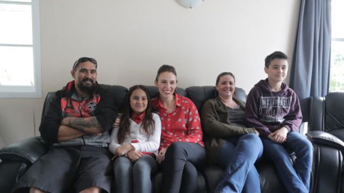 Jacinda Arden with the Lipsham family at their home in Henderson (Photo New Zealand Herald)