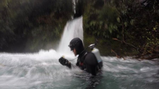 A search member continues day nine of the search for the two missing men. (Photo: NZ Herald/Supplied)