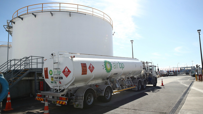  A BP avation petrol tanker next to fuel supply tanks at Auckland Airport. (Getty)