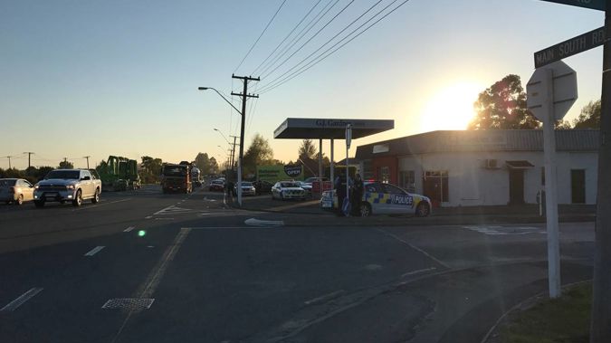 There is a massive police presence at a property in Christchurch this morning. (Photo \ NZ Herald)