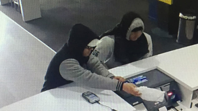 One of the men was described as wearing a light-coloured cap, shorts and sports shoes and a black and grey hoodie, while the other was wearing dark trousers, gumboots and a grey hoodie. (Photo: NZ Police)