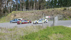 Police gather at the entrance to Tauranga Quarry in rural Welcome Bay after truck and trailer rolled this afternoon. (Photo/Zoe Hunter)