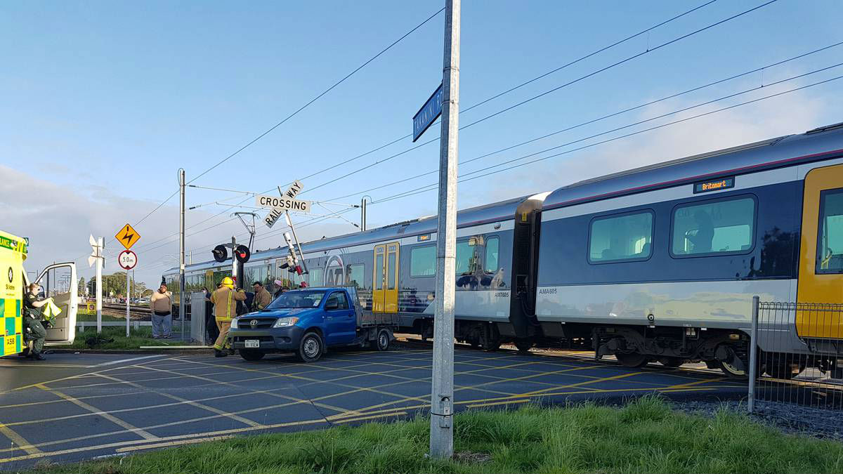A ute and a train collided in Takanini this morning.