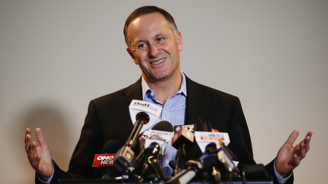 John Key hands out press conference (Photo \ Getty Images)