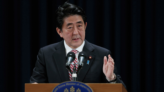 Abe says he is committed to protecting the Japanese people's prosperity and peace. (Getty)