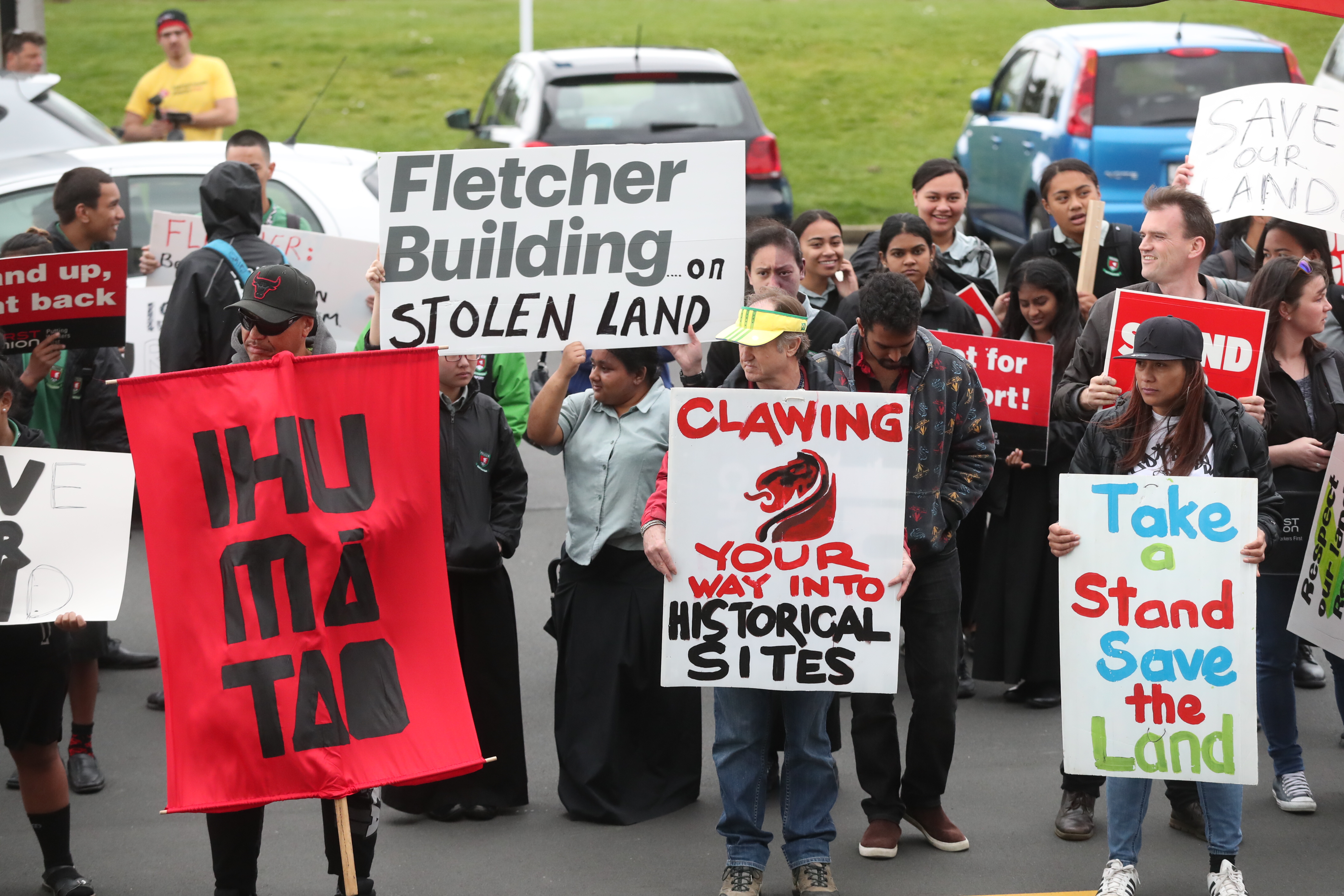 Two groups converged on Auckland Museum to protest the company. Photo/NZ Herald