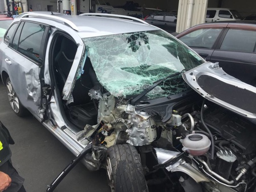 'Piece of scum' robs seriously injured woman trapped in car after crash. (Photo \ NZ HErald)