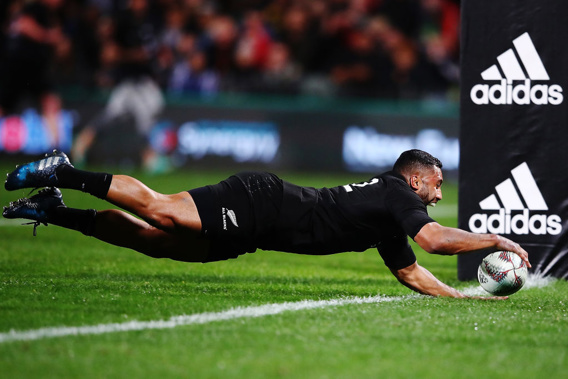 Liam Sopoaga scores one of the All Blacks' 997 tries. (Photo \ Getty Images)