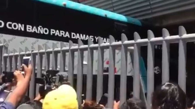 The All Whites team bus gets stuck at the venue for tomorrow's playoff against Peru in Lima.