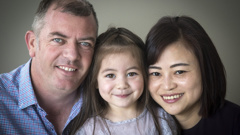 Hannah Cox, pictured here with her parents Iain and Wenyi, is a 4-year-old competing in NZ's first kids modelling competition, where the winners will get to compete in China. Photo/ Jason Oxenham