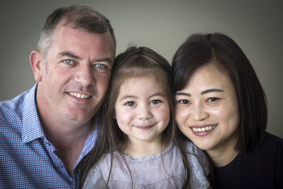 Hannah Cox, pictured here with her parents Iain and Wenyi, is a 4-year-old competing in NZ's first kids modelling competition, where the winners will get to compete in China. Photo/ Jason Oxenham