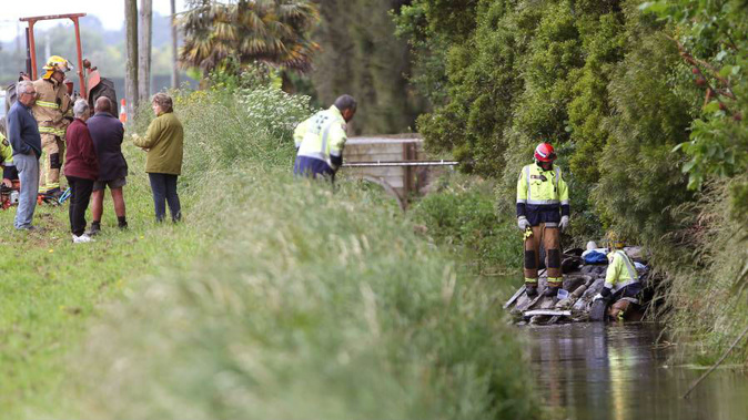 A driver was killed after crashing on Swamp Rd in Fernhill, Hawke's Bay and becoming trapped in the submerged vehicle on Sunday morning. (Photo \ Duncan Brown)