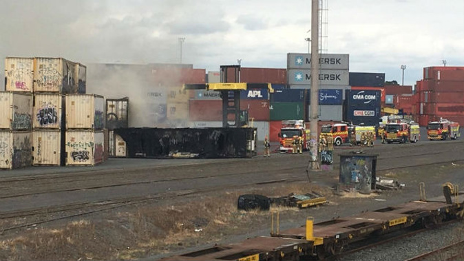 A container smoulders after firefighters put out the blaze. (Photo: Supplied)