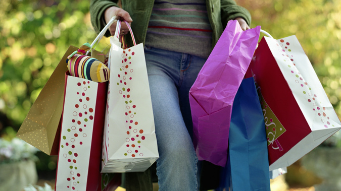 Black Friday and sunshine have prompted Kiwis to go on a shopping spree ahead of Christmas. (Photo / Getty Images)