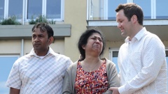 Sam Wijerathne, his wife Dinesha Amarasinghe, and Clutha-Southland MP Hamish Walker. (Photo / ODT)