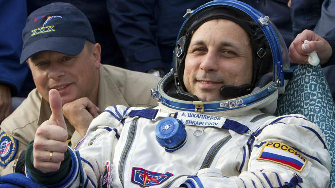 Russian cosmonaut Anton Shkaplerov gives the thumbs after returning to earth in 2012. (Photo / NZ Herald)