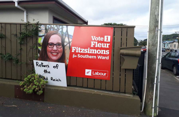 The sign left on Fleur Fitzsimons' fence has been widely condemned. (Photo/Twitter)