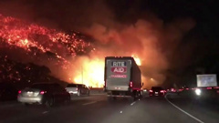 Dramatic footage shows the massive wildfires that are raging near Interstate 405 in California.