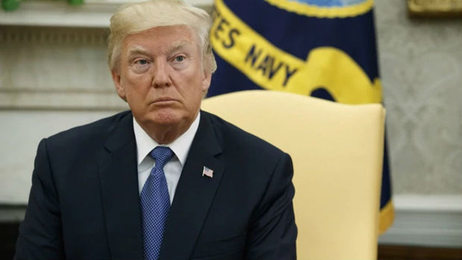 The President powers himself on caffeine, according to a report (Images / AP)