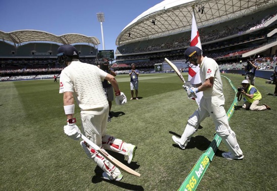 England batsmen Joe Root, right, and Chris Woakes walk on for the start of the fifth day of the second Ashes test. (Photo / AP)