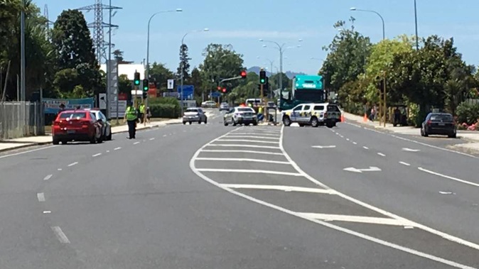 Police at the scene of the fatal crash on Ruakura Rd where an elderly woman was struck down by a Toll truck on a pedestrian crossing. (Photo / Natalie Akoorie)
