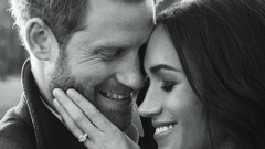 Prince Harry and Meghan Markle pose for one of two official engagement photo. (Photo \ AP)